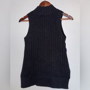 French Connection knitted tank top in black 
Slits on the sides